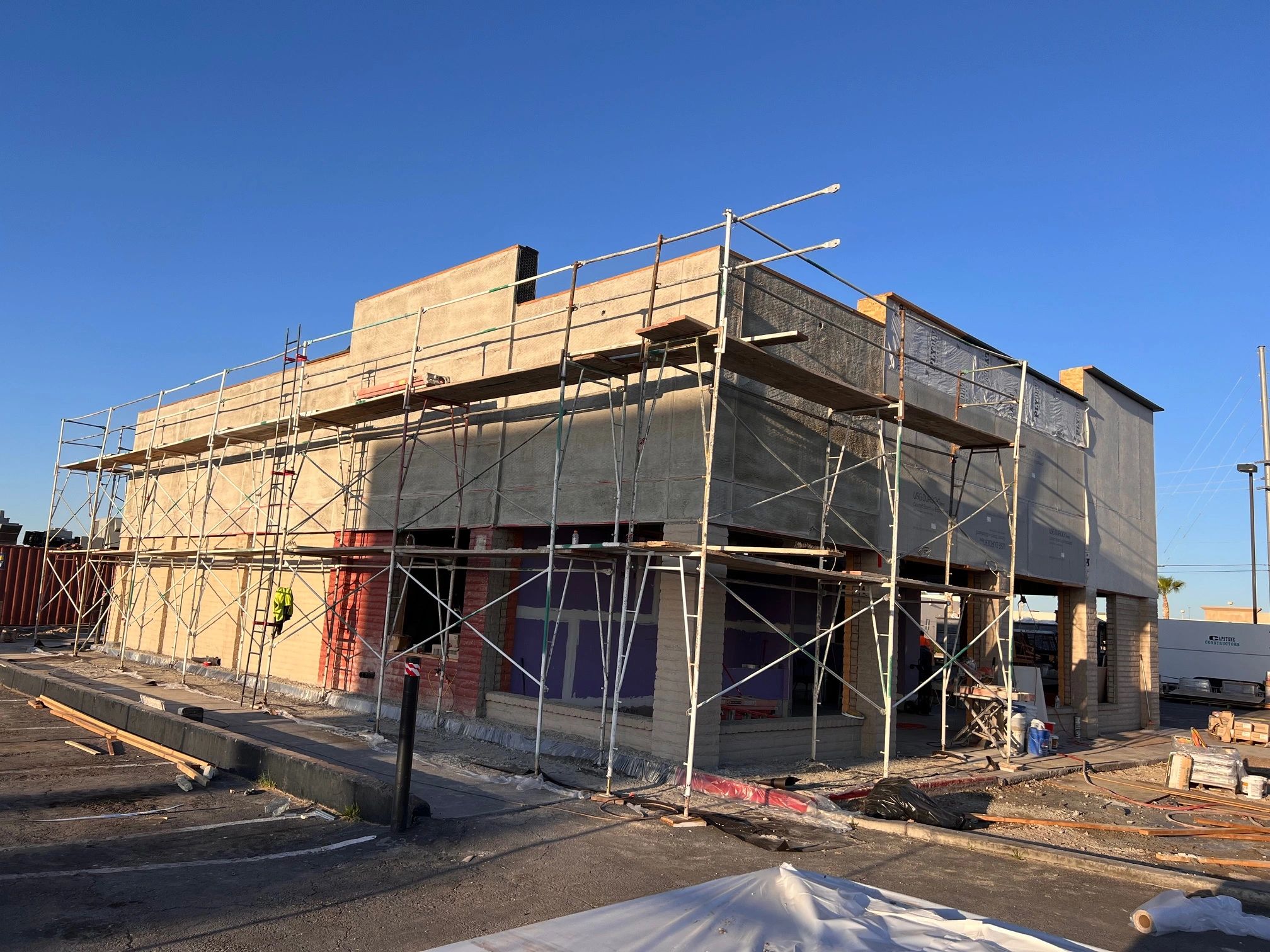 Building under construction with scaffolding